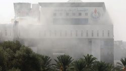 Smoke rises form the headquarters of Libyan state oil firm National Oil Corporation (NOC) after three masked persons attacked it in Tripoli, Libya September 10, 2018. REUTERS/Hani Amara