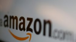 FILE PHOTO: The logo of the web service Amazon is pictured in this June 8, 2017 illustration photo. REUTERS/Carlos Jasso/Illustration/File Photo