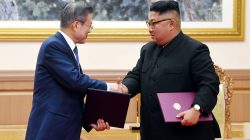 South Korean President Moon Jae-in shakes hands with North Korean leader Kim Jong Un after signing the joint statement in Pyongyang, North Korea, September 19, 2018. Pyeongyang Press Corps/Pool via REUTERS