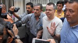 FILE PHOTO: U.S. pastor Andrew Brunson reacts as he arrives at his home after being released from the prison in Izmir, Turkey July 25, 2018. Demiroren News Agency/DHA via REUTERS/File Photo