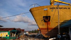 FILE PHOTO: The KM Sabuk Nusantara 39 ship is seen stranded on the shore after the earthquake and tsunami hit an area in Wani, Donggala, Central Sulawesi, Indonesia October 3, 2018. REUTERS/Athit Perawongmetha/File Photo