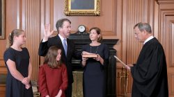 Judge Brett Kavanaugh is sworn in as an Associate Justice of the U.S. Supreme Court by Chief Justice John Roberts as Kavanaugh's wife Ashley holds the family bible and his daughters Liza and Margaret look on in a handout photo provided by the U.S. Supreme Court taken at the Supreme Court building in Washington, U.S., October 6, 2018. Fred Schilling/Collection of the Supreme Court of the United States/Handout via Reuters