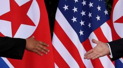 FILE PHOTO: U.S. President Donald Trump and North Korea's leader Kim Jong Un meet at the start of their summit at the Capella Hotel on the resort island of Sentosa, Singapore June 12, 2018. REUTERS/Jonathan Ernst/File Photo