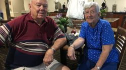 JW and Helen Neal sit in a hotel one mile from their beachfront house due to Hurricane Michael, in Panama City, Florida, U.S., October 10, 2018. REUTERS/Rod Nickel