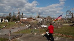 Dexter Humphries looks at destruction caused by Hurricane Michael from his driveway in Springfield, Florida, U.S., October 14, 2018. REUTERS/Terray Sylvester