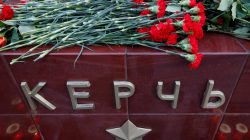 Flowers are seen placed at a memorial by the Kremlin walls to commemorate the victims of a fatal attack on a college in the Crimean port city of Kerch, in Moscow, Russia October 17, 2018. REUTERS/Sergei Karpukhin