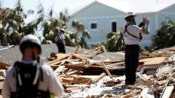 A search and rescue team works in homes destroyed by Hurricane Michael in Mexico Beach, Florida, U.S., October 16, 2018. REUTERS/Terray Sylvester