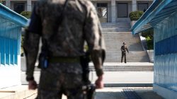 FILE PHOTO: A North Korean soldier patrols at the truce village of Panmunjom inside the demilitarized zone (DMZ) separating the two Koreas, South Korea, April 18, 2018. Picture taken on April 18, 2018. REUTERS/Kim Hong-Ji