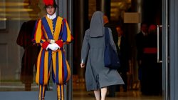 FILE PHOTO: A nun enters to take part at the synod afternoon session led by Pope Francis at the Vatican October 16, 2018. Picture taken October 16, 2018. REUTERS/Max Rossi