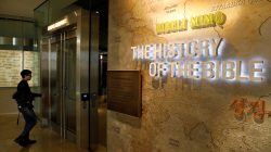 FILE PHOTO: A visitor enters an exhibit room during a preview at the Museum of the Bible in Washington, U.S., November 14, 2017. REUTERS/Kevin Lamarque/File Photo