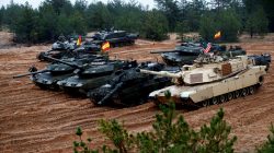 FILE PHOTO: U.S., German, Spanish and Polish troops of the NATO enhanced Forward Presence battle goups with their tanks get ready for the Iron Tomahawk exercise in Adazi, Latvia October 23, 2018. REUTERS/Ints Kalnins