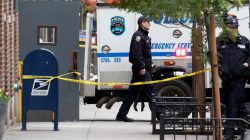 New York City Police Department (NYPD) officers stand outside a U.S. Postal Service facility after a suspicious package was discovered there in the Manhattan borough of New York, New York, U.S., October 26, 2018. REUTERS/Mike Segar