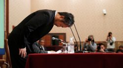 Jumpei Yasuda, the Japanese journalist held in Syria for more than three years, bows during a news conference for the first time since his release last month, at the Japan National Press Club in Tokyo, Japan November 2, 2018. REUTERS/Issei Kato