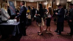 People wait in line at a stand during the Executive Branch Job Fair hosted by the Conservative Partnership Institute at the Dirksen Senate Office Building in Washington, U.S., June 15, 2018. REUTERS/Toya Sarno Jordan