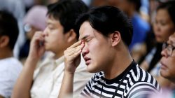 A man, who had family on the crashed Lion Air flight JT610, cries as he attends a news conference about the recovery process at a hotel in Jakarta, Indonesia, November 5, 2018. REUTERS/Willy Kurniawan