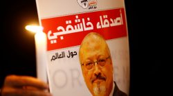 A demonstrator holds a poster with a picture of Saudi journalist Jamal Khashoggi outside the Saudi Arabia consulate in Istanbul, Turkey October 25, 2018. REUTERS/Osman Orsal
