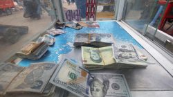 FILE PHOTO: Iranian rials, U.S. dollars and Iraqi dinars are seen at a currency exchange shopÊin Basra, Iraq November 3, 2018. REUTERS/Essam al-Sudani