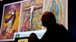 Cardinal Daniel DiNardo (R), president of the U.S. Conference of Catholic Bishops, speaks with other attendees at the USCCB general assembly in Baltimore, Maryland, U.S., November 12, 2018. REUTERS/Kevin Lamarque